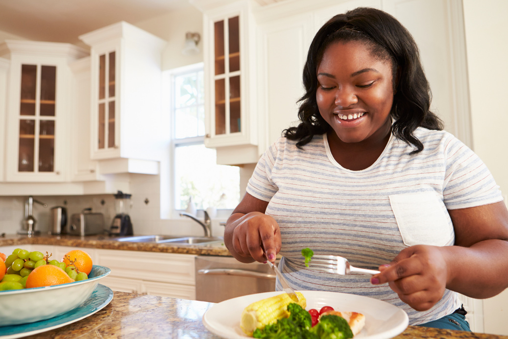 Woman Eating Healthy Meal 